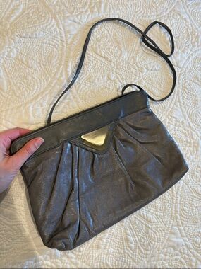 Sleek Gray Leather Clutch/Shoulder Bag with Silver & Gold Accent